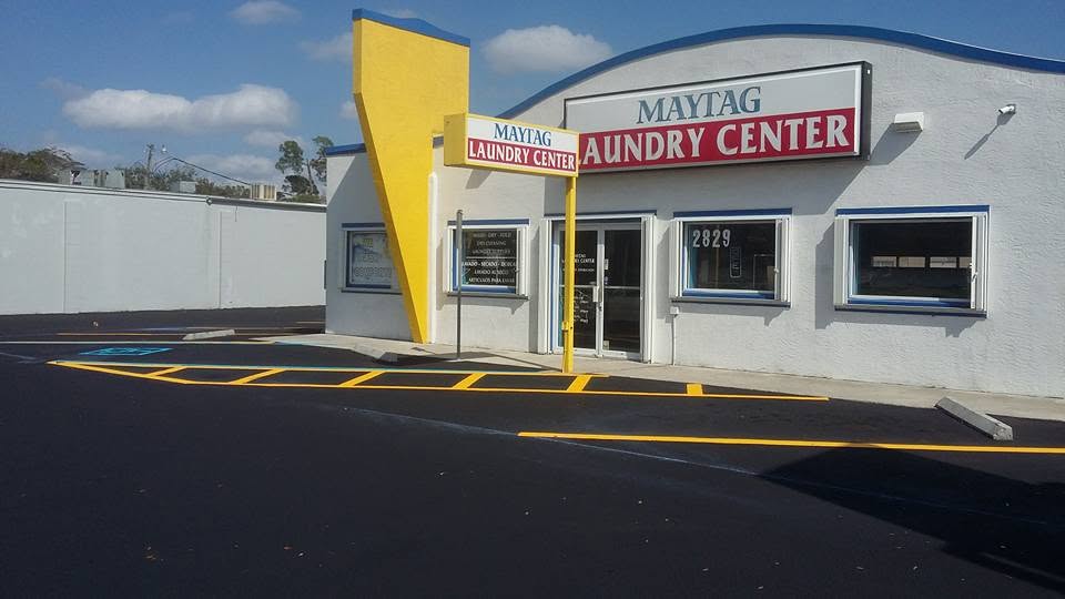Freshly sealcoated and striped commercial parking lot in Lee County, Florida